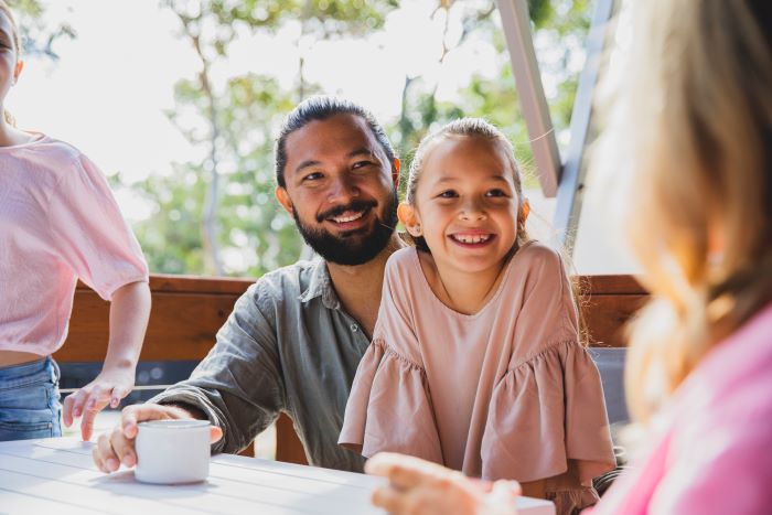 Image of a father with his daughter