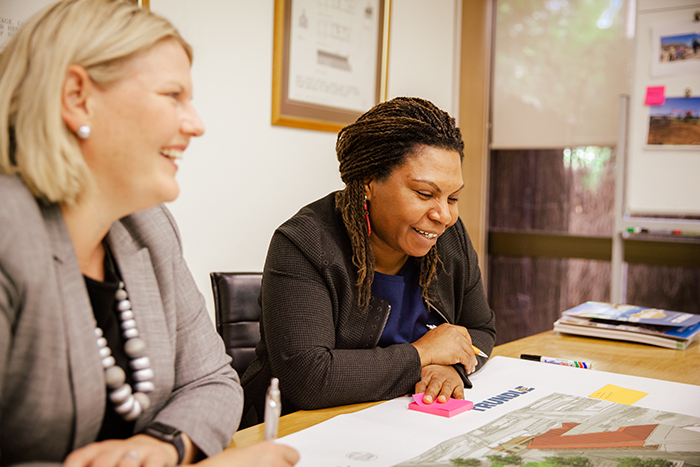 Image of two women having a meeting