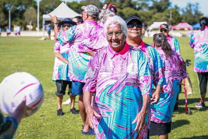 Image of a female team playing netball