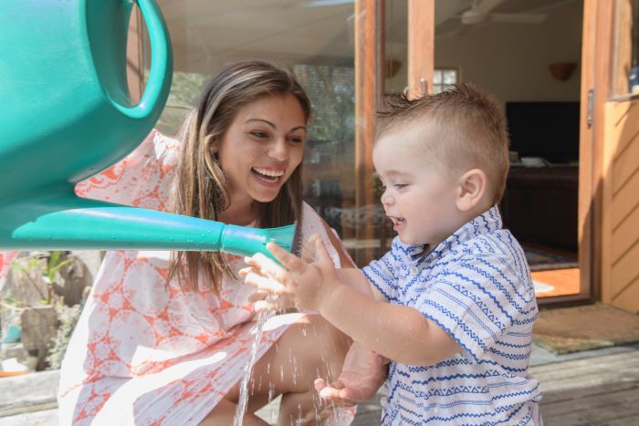 Image of a mother playing with her toddler