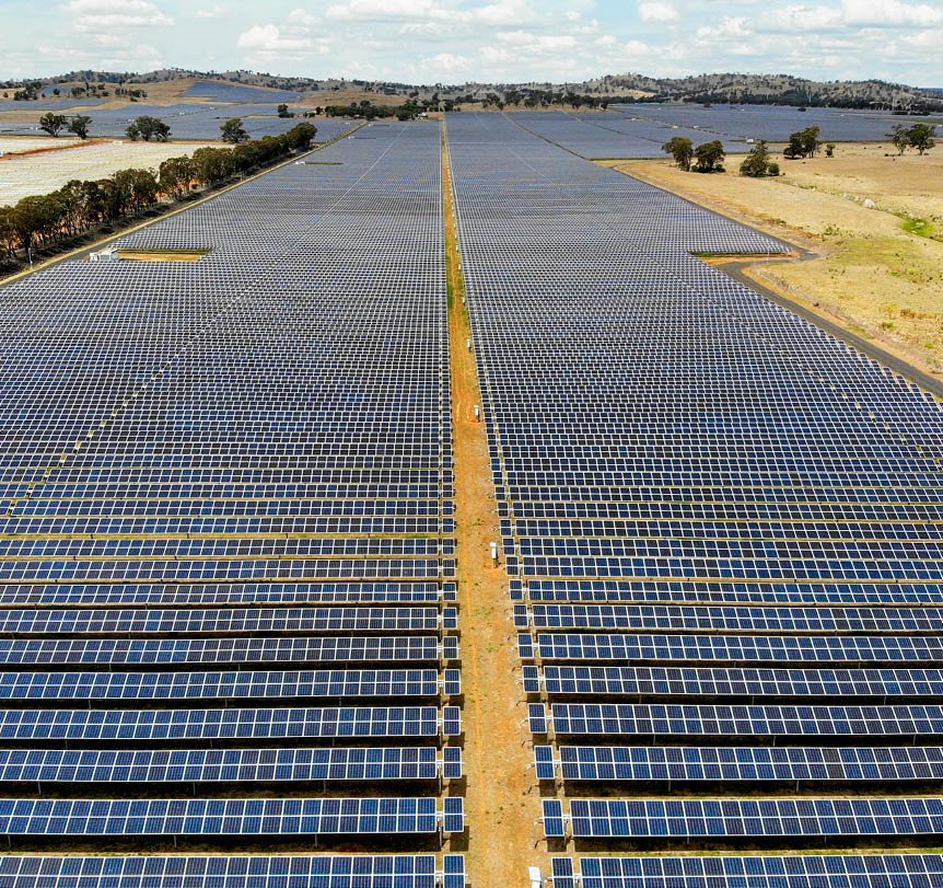 A large solar farm in a field