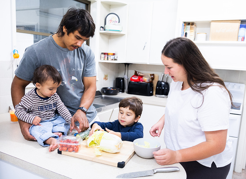 A family cooking in the kitchen