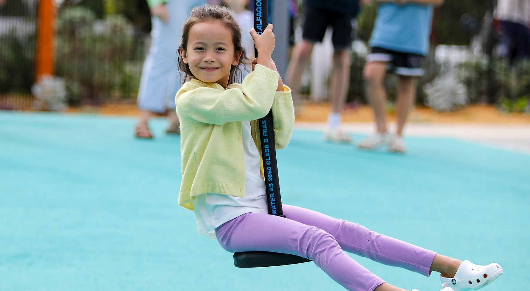 A child swinging on a swing